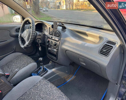 Синій Деу Ланос, об'ємом двигуна 1.5 л та пробігом 300 тис. км за 1999 $, фото 10 на Automoto.ua