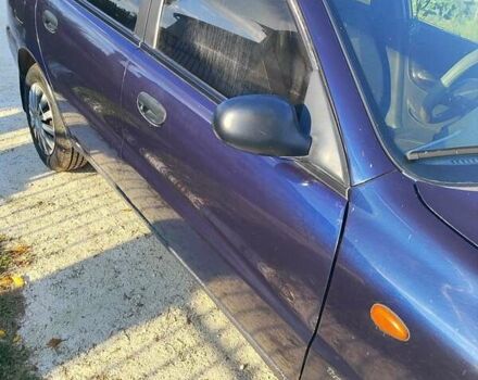 Синий Дэу Ланос, объемом двигателя 1.5 л и пробегом 251 тыс. км за 2200 $, фото 4 на Automoto.ua