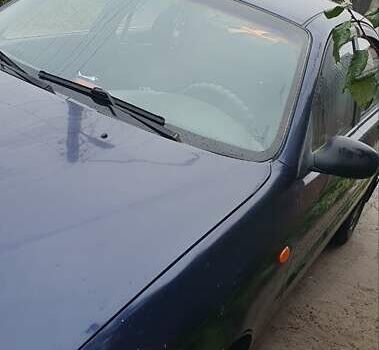 Синий Дэу Ланос, объемом двигателя 1.5 л и пробегом 200 тыс. км за 2100 $, фото 5 на Automoto.ua