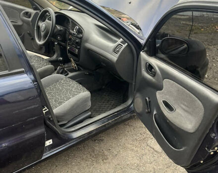 Синій Деу Ланос, об'ємом двигуна 1.5 л та пробігом 200 тис. км за 1250 $, фото 10 на Automoto.ua