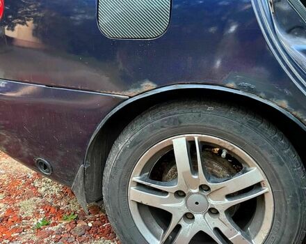 Синий Дэу Ланос, объемом двигателя 1.5 л и пробегом 250 тыс. км за 1000 $, фото 5 на Automoto.ua