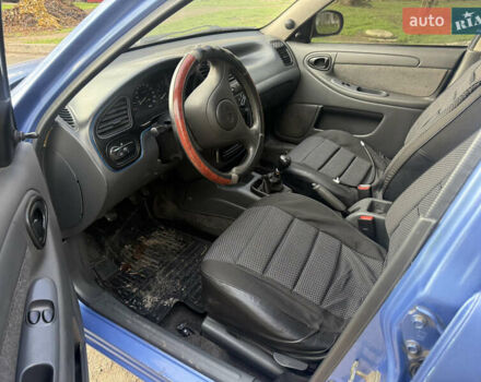 Синий Дэу Ланос, объемом двигателя 1.5 л и пробегом 180 тыс. км за 1500 $, фото 8 на Automoto.ua