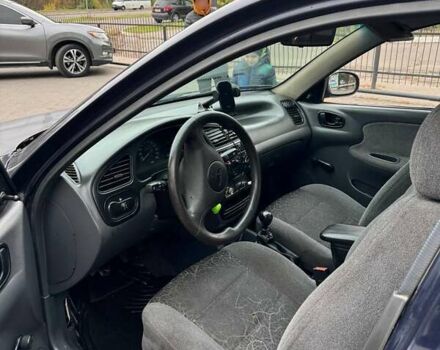 Синий Дэу Ланос, объемом двигателя 1.5 л и пробегом 270 тыс. км за 2150 $, фото 6 на Automoto.ua