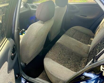 Синий Дэу Ланос, объемом двигателя 1.5 л и пробегом 14 тыс. км за 2100 $, фото 3 на Automoto.ua