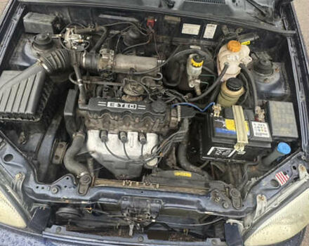 Синій Деу Ланос, об'ємом двигуна 1.5 л та пробігом 205 тис. км за 2000 $, фото 5 на Automoto.ua