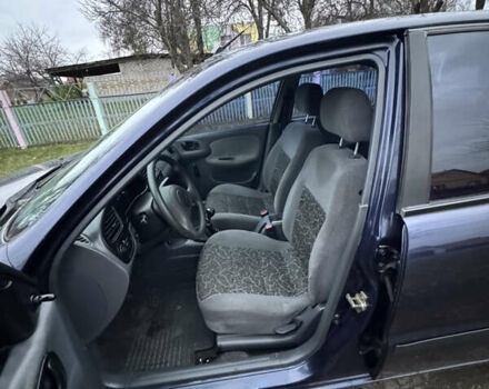 Синий Дэу Ланос, объемом двигателя 1.45 л и пробегом 211 тыс. км за 2800 $, фото 6 на Automoto.ua