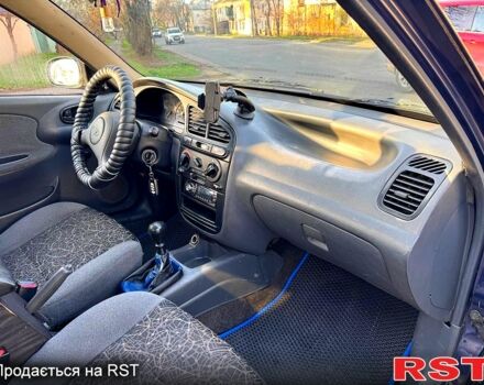 Синій Деу Ланос, об'ємом двигуна 1.5 л та пробігом 300 тис. км за 1999 $, фото 8 на Automoto.ua