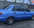 Синий Дэу Ланос, объемом двигателя 1.5 л и пробегом 230 тыс. км за 2400 $, фото 1 на Automoto.ua