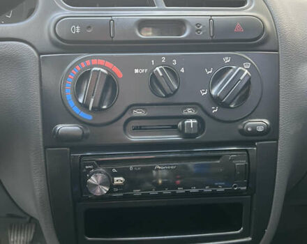 Синий Дэу Ланос, объемом двигателя 1.5 л и пробегом 130 тыс. км за 3400 $, фото 20 на Automoto.ua