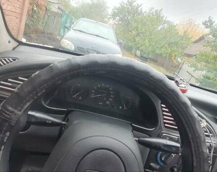 Синий Дэу Ланос, объемом двигателя 1.5 л и пробегом 200 тыс. км за 2100 $, фото 1 на Automoto.ua