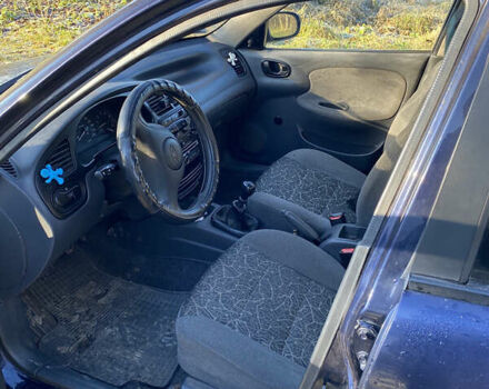 Синій Деу Ланос, об'ємом двигуна 1.5 л та пробігом 189 тис. км за 1750 $, фото 4 на Automoto.ua