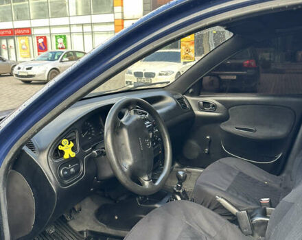 Синий Дэу Ланос, объемом двигателя 1.5 л и пробегом 145 тыс. км за 1899 $, фото 11 на Automoto.ua