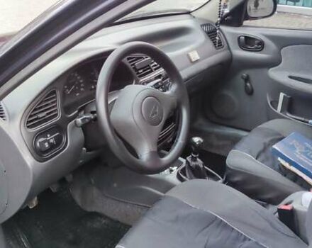 Синий Дэу Ланос, объемом двигателя 1.5 л и пробегом 194 тыс. км за 2593 $, фото 6 на Automoto.ua