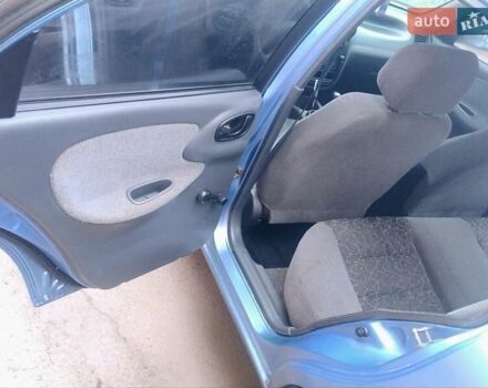 Синій Деу Ланос, об'ємом двигуна 1.5 л та пробігом 215 тис. км за 2200 $, фото 10 на Automoto.ua
