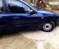 Синий Дэу Ланос, объемом двигателя 1.5 л и пробегом 220 тыс. км за 2000 $, фото 6 на Automoto.ua