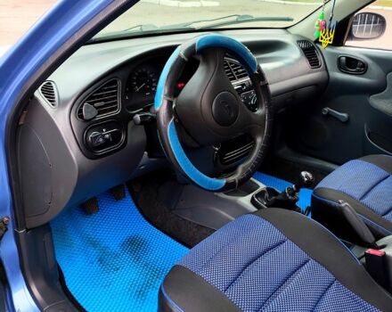 Синий Дэу Ланос, объемом двигателя 1.5 л и пробегом 193 тыс. км за 1850 $, фото 9 на Automoto.ua