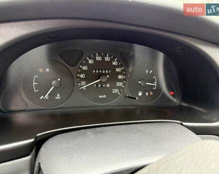 Синий Дэу Ланос, объемом двигателя 1.4 л и пробегом 224 тыс. км за 1390 $, фото 11 на Automoto.ua