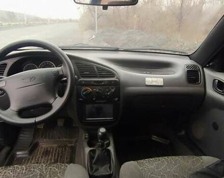 Синий Дэу Ланос, объемом двигателя 1.6 л и пробегом 172 тыс. км за 3100 $, фото 4 на Automoto.ua