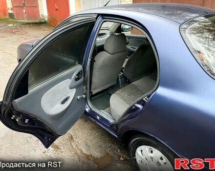 Синій Деу Ланос, об'ємом двигуна 1.5 л та пробігом 245 тис. км за 1650 $, фото 3 на Automoto.ua