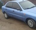 Синий Дэу Ланос, объемом двигателя 1.5 л и пробегом 157 тыс. км за 1550 $, фото 3 на Automoto.ua