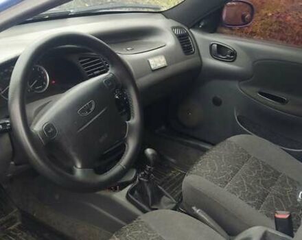 Синий Дэу Ланос, объемом двигателя 1.6 л и пробегом 172 тыс. км за 3100 $, фото 8 на Automoto.ua