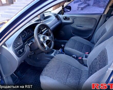 Синий Дэу Ланос, объемом двигателя 1.5 л и пробегом 217 тыс. км за 2100 $, фото 3 на Automoto.ua