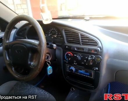 Синий Дэу Ланос, объемом двигателя 1.5 л и пробегом 280 тыс. км за 2100 $, фото 10 на Automoto.ua