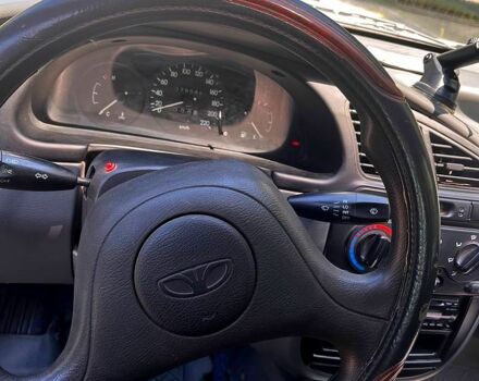 Синий Дэу Ланос, объемом двигателя 1.4 л и пробегом 79 тыс. км за 2200 $, фото 3 на Automoto.ua