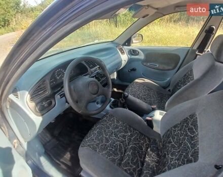 Синій Деу Ланос, об'ємом двигуна 1.5 л та пробігом 220 тис. км за 1380 $, фото 2 на Automoto.ua