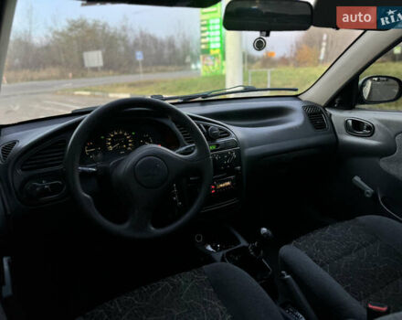 Синій Деу Ланос, об'ємом двигуна 1.5 л та пробігом 153 тис. км за 1850 $, фото 20 на Automoto.ua