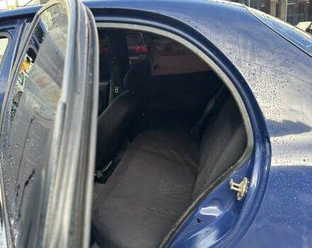 Синий Дэу Ланос, объемом двигателя 1.5 л и пробегом 145 тыс. км за 1899 $, фото 12 на Automoto.ua