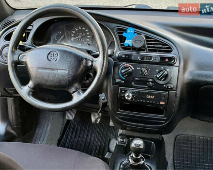 Синій Деу Ланос, об'ємом двигуна 1.5 л та пробігом 140 тис. км за 1450 $, фото 18 на Automoto.ua