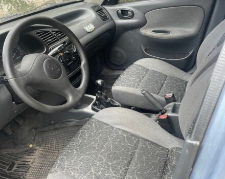 Синій Деу Ланос, об'ємом двигуна 1.5 л та пробігом 250 тис. км за 1050 $, фото 5 на Automoto.ua