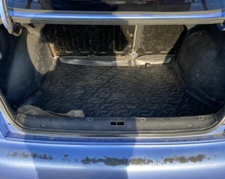 Синий Дэу Ланос, объемом двигателя 1.4 л и пробегом 320 тыс. км за 1300 $, фото 4 на Automoto.ua