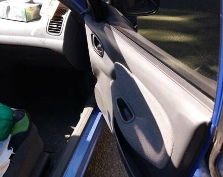 Синий Дэу Ланос, объемом двигателя 1.6 л и пробегом 135 тыс. км за 2000 $, фото 5 на Automoto.ua