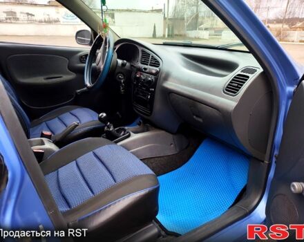 Синий Дэу Ланос, объемом двигателя 1.5 л и пробегом 193 тыс. км за 1850 $, фото 8 на Automoto.ua