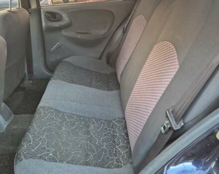 Синий Дэу Ланос, объемом двигателя 1.6 л и пробегом 125 тыс. км за 1600 $, фото 18 на Automoto.ua