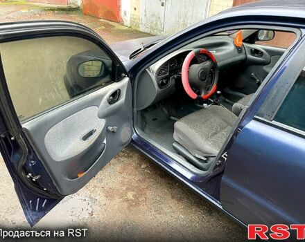 Синій Деу Ланос, об'ємом двигуна 1.5 л та пробігом 245 тис. км за 1650 $, фото 2 на Automoto.ua