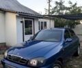 Синий Дэу Ланос, объемом двигателя 1.5 л и пробегом 237 тыс. км за 2150 $, фото 1 на Automoto.ua