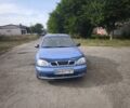 Синий Дэу Ланос, объемом двигателя 1.6 л и пробегом 1 тыс. км за 2600 $, фото 2 на Automoto.ua