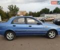 Синий Дэу Ланос, объемом двигателя 1.6 л и пробегом 239 тыс. км за 1800 $, фото 2 на Automoto.ua