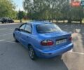 Синій Деу Ланос, об'ємом двигуна 1.39 л та пробігом 161 тис. км за 2299 $, фото 3 на Automoto.ua