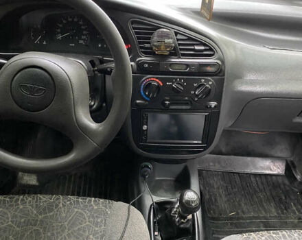 Синий Дэу Ланос, объемом двигателя 1.5 л и пробегом 305 тыс. км за 2000 $, фото 7 на Automoto.ua