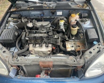 Синій Деу Ланос, об'ємом двигуна 1.5 л та пробігом 250 тис. км за 1050 $, фото 3 на Automoto.ua