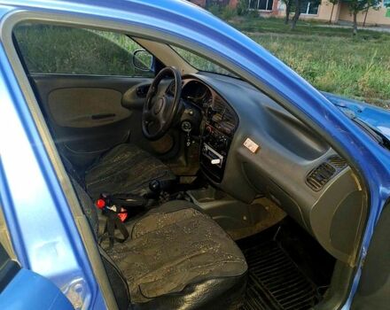 Синий Дэу Ланос, объемом двигателя 1.4 л и пробегом 230 тыс. км за 2160 $, фото 5 на Automoto.ua