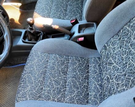 Синий Дэу Ланос, объемом двигателя 1.5 л и пробегом 97 тыс. км за 3500 $, фото 12 на Automoto.ua