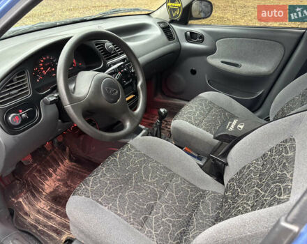 Синій Деу Ланос, об'ємом двигуна 1.39 л та пробігом 200 тис. км за 2350 $, фото 7 на Automoto.ua