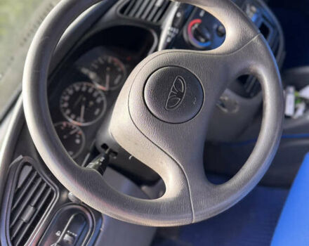 Синий Дэу Ланос, объемом двигателя 1.5 л и пробегом 250 тыс. км за 3600 $, фото 11 на Automoto.ua