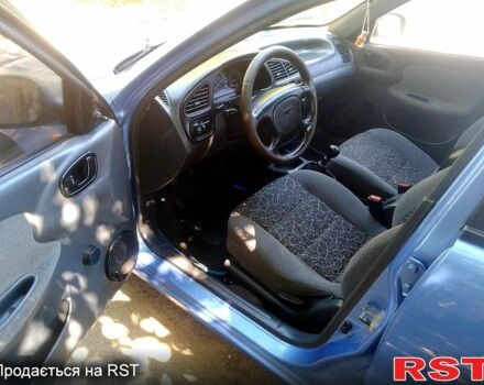 Синий Дэу Ланос, объемом двигателя 1.5 л и пробегом 280 тыс. км за 2100 $, фото 7 на Automoto.ua