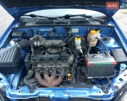 Синий Дэу Ланос, объемом двигателя 1.5 л и пробегом 113 тыс. км за 1800 $, фото 3 на Automoto.ua